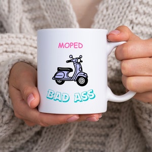 A funny motor scooter mug with soft watercolor design – the perfect gift for the moped rider in your life who loves coffee or tea!