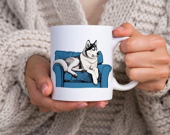 Siberian Husky Sitting on Blue Armchair Mug