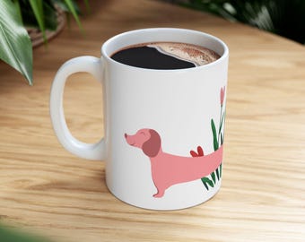A sweet pink dachshund surrounded by delicate blooms. Minimalist, charming, and adorable because some days call for a little beauty.
