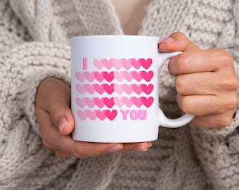 Ich liebe dich Kaffeebecher. Doppelseitiges Design, perfekt für den Valentinstag, um Ihre Liebe auf die süßeste Art und Weise zu zeigen.