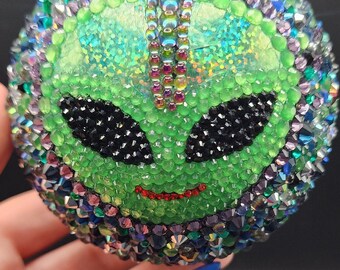 Green alien glow in the dark sparkly Christmas ornament