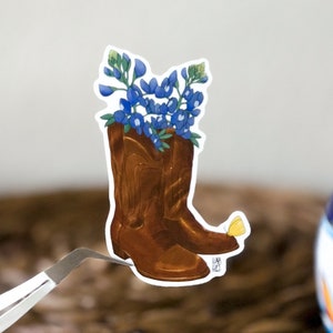 Pegatina de vinilo con botas de vaquero y lupino azul