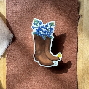 Pegatina de vinilo con botas de vaquero y lupino azul