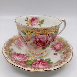 Royal Albert Unnamed Heavy Gold and Pink Rose Teacup and Saucer