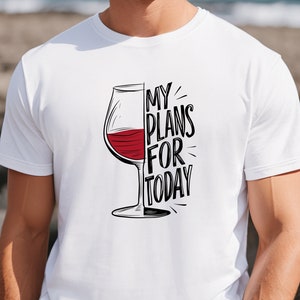 May include: White t-shirt with a black and red illustration of a wine glass and the text "My Plans For Today".