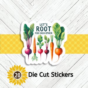 May include: A die cut sticker featuring a colorful illustration of various root vegetables including beets and carrots with green leafy tops. The text LET'S ROOT FOR EACH OTHER is printed in dark green letters above the vegetables on a white background.