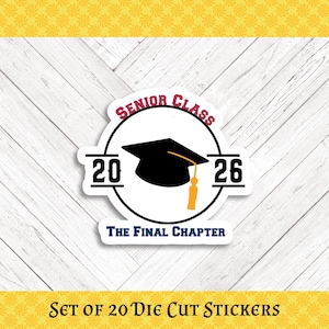 May include: Die-cut sticker with a graduation theme. The sticker features a black graduation cap, the words "Senior Class 2026", and "The Final Chapter" in a circular design. The sticker is white with black and orange accents.