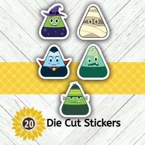 May include: A set of 20 die cut stickers featuring five different candy corn characters dressed as Halloween figures: a witch, a mummy, a vampire, a zombie, and a Frankenstein monster, each with a unique facial expression and costume.