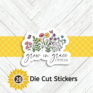 May include: A die-cut sticker featuring a floral design with the words "grow in grace" and the Bible verse 2 Peter 3:18. The sticker includes colorful flowers and butterflies. A sunflower graphic and the text "20 Die Cut Stickers" are also present.