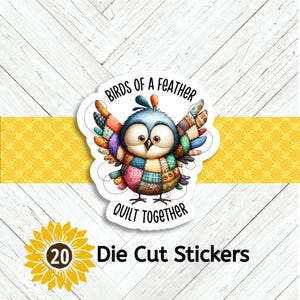May include: A die-cut sticker featuring a colorful bird with patchwork wings and body. The sticker has the text "Birds of a Feather Quilt Together". A sunflower graphic with the number "20" is in the lower left corner. The background is white and yellow.