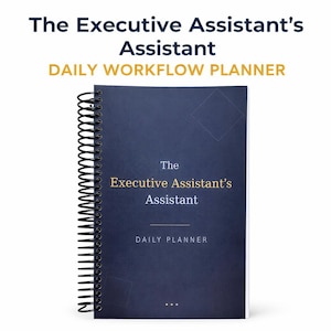 May include: A navy blue spiral-bound planner titled "The Executive Assistant's Assistant." The cover features the title in white and gold text, with "DAILY WORKFLOW PLANNER" above and "DAILY PLANNER" below. The planner is on a white background.