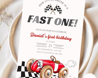 May include: A red and white race car birthday party invitation with a checkered flag background. The text reads "Our little racer is a fast one!" and "Race on over to celebrate Daniel's first birthday".