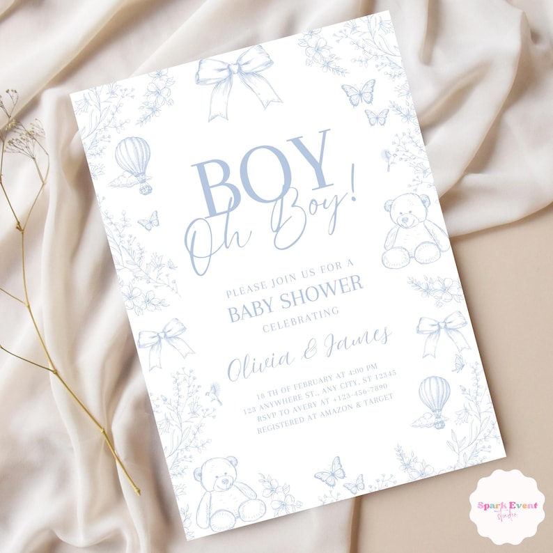 Op de afbeelding: Een blauwe en witte baby shower uitnodiging met een bloemenontwerp. De uitnodiging zegt "Boy! Oh Boy!" en bevat de tekst "Kom gezellig met ons mee naar een baby shower ter ere van Olivia & James".