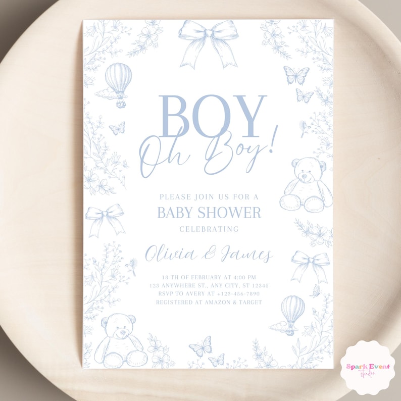 Op de afbeelding: Blauwe en witte baby shower uitnodiging met een bloemenontwerp. De uitnodiging zegt "BOY Oh Boy!" en bevat de tekst "Kom gezellig met ons mee naar een baby shower ter ere van Olivia & James".