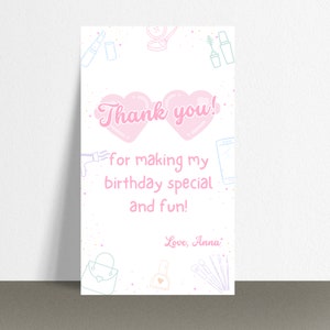 May include: A white card with pink and blue illustrations of makeup items. The card features the text "Thank you!" above the message "for making my birthday special and fun!" and is signed "Love, Anna."