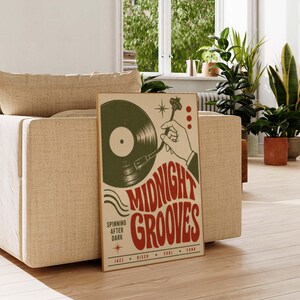 May include: A rectangular poster featuring a green vinyl record being played by a hand on a turntable. The text reads MIDNIGHT GROOVES, SPINNING AFTER DARK, JAZZ, DISCO, SOUL, FUNK. The design uses a cream background with red and green accents.