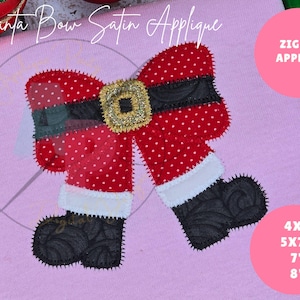 May include: Red and white Santa bow applique with black belt and boots. Zig Zag Applique. 4x4, 5x7, 7, 8 inches.