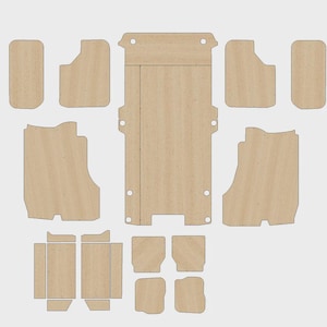 May include: A collection of laser-cut wooden pieces, likely for a DIY project or craft. The pieces are various shapes and sizes, including rectangular, curved, and notched components. The wood has a light brown color and a visible grain.