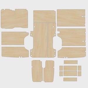 May include: A collection of pre-cut plywood pieces, likely for a DIY project. The pieces are various shapes and sizes, with a light wood grain finish. The arrangement suggests components for a larger structure or furniture item.