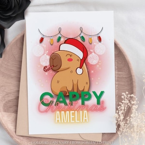 Biglietto di auguri natalizio personalizzato con capibara, biglietto di auguri natalizio con animali, biglietto di auguri divertente per bambini, biglietto di auguri natalizio con umorismo e gioco di parole, biglietto di auguri divertente per le feste