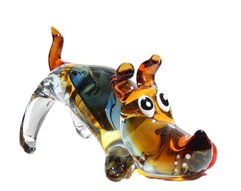 Realza tu espacio con esta impresionante estatua moderna de perro de cristal, una obra maestra artesanal diseñada para aportar un toque de lujo a cualquier habitación.