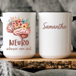 May include: White ceramic mug with a black handle and rim. One side features a brain illustration adorned with flowers, the word "NEURO", and "intensive care unit". The other side displays the name "Samantha" in a script font.