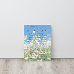 May include: A white canvas print with a blue sky background and white daisies. The print features a Christian hymn about praising Jesus. The text reads: "Blessed assurance, Jesus is mine! Oh, what a foretaste of glory divine! Heir of salvation, purchase of God Born of His Spirit, washed in His blood This is my story, this is my song Praising my Savior all the day long This is my story, this is my song Praising my Savior all the day long"