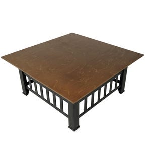 May include: A square coffee table with a brown wood top and a black metal frame. The frame has a slatted design.