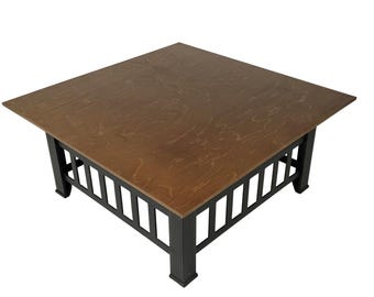 May include: A square coffee table with a brown wood top and a black metal frame. The frame has a slatted design.