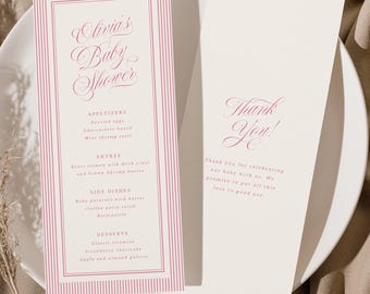 Könnte beinhalten: Eine Babyparty-Menükarte und eine Dankeskarte auf einem weißen Teller. Das Menü hat einen rosa gestreiften Rand und den Text "Olivia's Baby Shower". Die Dankeskarte trägt den Text "Thank You!"