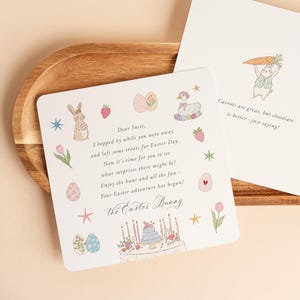 Könnte beinhalten: Ein Set aus drei Keramikbechern mit gesprenkelter, matter Oberfläche. Die Becher sind in Creme-, Hellgrau- und Dunkelgrautönen gehalten. Jeder Becher hat ein schlichtes, minimalistisches Design, perfekt für Kaffee oder Tee.