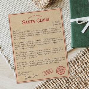 May include: A vintage-style letter from Santa Claus to a child, written on brown paper with a red border. The letter includes a handwritten message about being good and the magic of Christmas. The letter is stamped with a red "Nice List Approved" stamp and a "North Pole Postal Service" stamp.