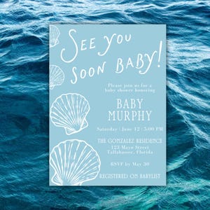 May include: A baby shower invitation in light blue, featuring white text and seashell designs. The invitation says "See You Soon Baby!" and provides event details, including the name "Baby Murphy", date, time, and location.