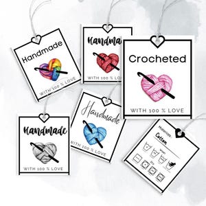 May include: Five white square gift tags with black borders and hearts. Each tag features a crocheted heart with yarn and a crochet hook. The text on the tags reads "Handmade with 100% Love" and "Crocheted with 100% Love". One tag has a separate section with the text "Materials: Cotton" and washing instructions.