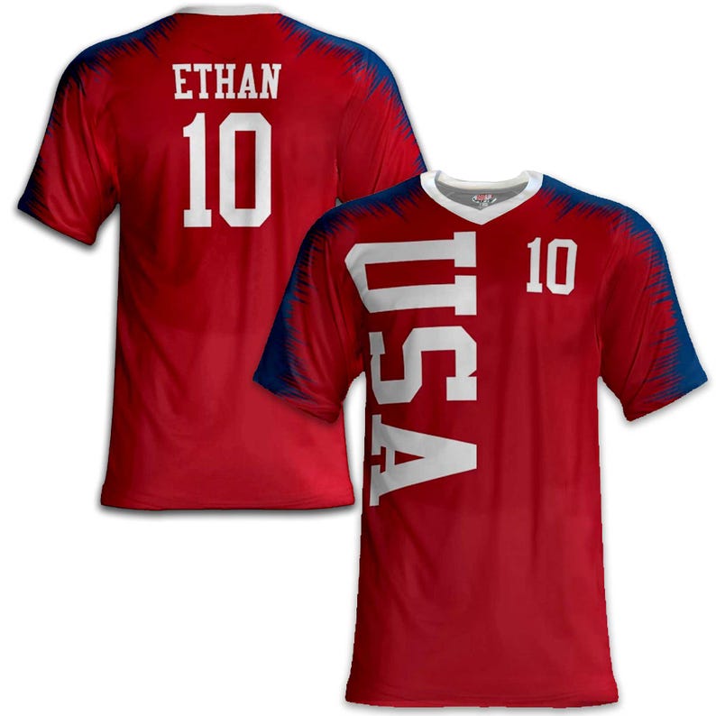 May include: Red athletic jersey with white lettering and the number 10. The word "USA" is printed vertically on the front. The name "ETHAN" and the number 10 are on the back. The jersey has blue accents.
