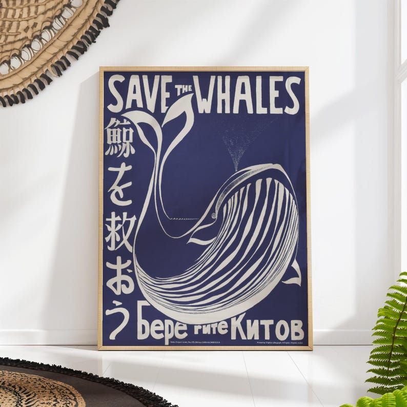 May include: A blue and white poster with the text "Save the Whales" in white lettering. The poster features a stylized illustration of a whale with Japanese text and the phrase "Берегите китов" in Cyrillic script.