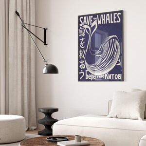 May include: A poster with a blue background and a white whale design. The poster says "Save the Whales" in white text and has text in Japanese and Russian.
