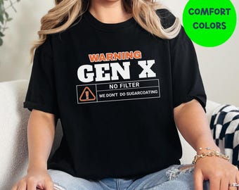 May include: Black t-shirt with the text "WARNING GEN X NO FILTER WE DON'T DO SUGARCOATING" in white and orange. The text is in a warning sign style.