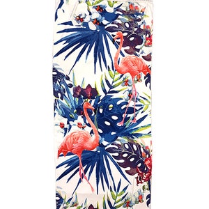 May include: White beach towel with a tropical print featuring pink flamingos, blue palm leaves, and colorful flowers.