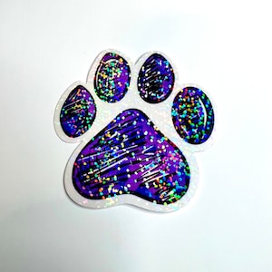 Paw print sticker in purple - waterproof vinyl decal for laptops, notebooks, tumblers, and more