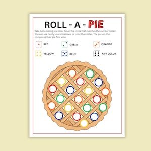 May include: A printable game sheet titled "ROLL - A - PIE". The game features a pie graphic with colored circles and dice illustrations. Instructions are included to cover circles matching the dice roll. Colors include red, green, orange, yellow, and blue.