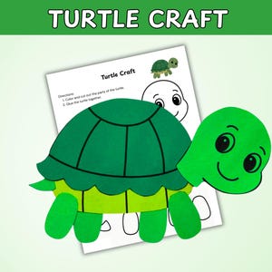 May include: A green felt turtle craft with a green shell and head, and yellow legs. The craft is on a white paper with the text "Turtle Craft" and instructions. The words "TURTLE CRAFT" are at the top.