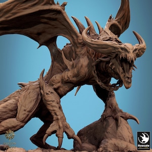 May include: A detailed brown dragon sculpture with large wings, sharp claws, and horns. The dragon is posed on a rocky surface against a light blue background. The sculpture has a menacing open mouth with visible teeth.