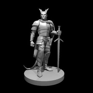 May include: A gray painted miniature figurine of a demon knight wearing armor and holding a sword. The figurine is standing on a round base.