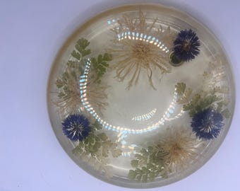 Vintage onderzetter op poot van lucite met bloemen
