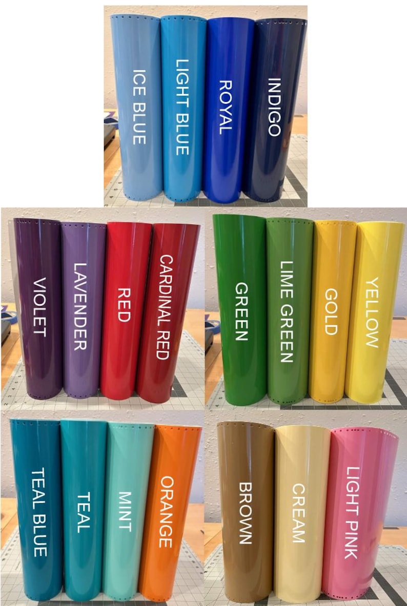 Puede incluir: Una colecci&oacute;n de rollos cil&iacute;ndricos de material liso y de color s&oacute;lido dispuestos en filas. Cada rollo presenta una etiqueta de color distinta que incluye Ice Blue, Light Blue, Royal, Indigo, Violet, Lavender, Red, Cardinal Red, Green, Lime Green, Gold, Yellow, Teal Blue, Teal, Mint, Orange, Brown, Cream y Light Pink.