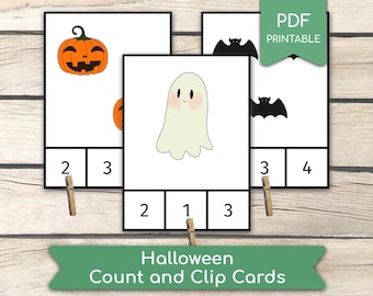 Könnte beinhalten: Drei druckbare Halloween-Zähl- und Klammerkarten mit einem Geist, einem Kürbis und einer Fledermaus. Jede Karte hat eine Anzahl von Bildern und eine entsprechende Anzahl von Plätzen für Wäscheklammern.