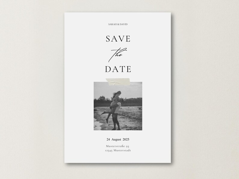 May include: A white card with the text "SAVE THE DATE" in elegant script. A black and white photo of a couple is taped to the card. The date "24 August 2025" and address are printed below the photo. Wedding announcement.