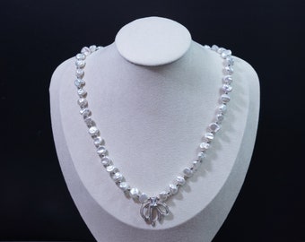 Natural Freshwater White Keshi Pearl Necklace, With A Lovely Ribbon. 925 Sterling Silver White Gold Plated and CZ gems.