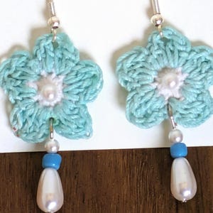 Crochet pearl earrings dangle with sterling silver wires, aquamarine/white flowers, white pearls, and turquoise beads. Lightweight & comfy!